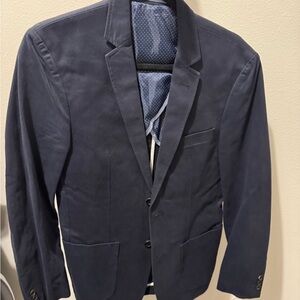 Combatant Gentlemen Blue Sport Coat with Notch Lapels and Structured Shoulders